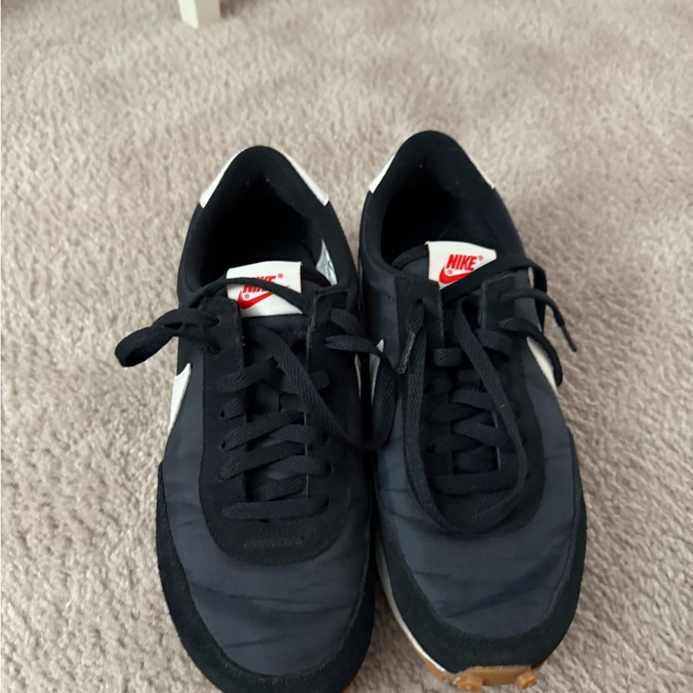 Nike women’s Black and White Sneakers